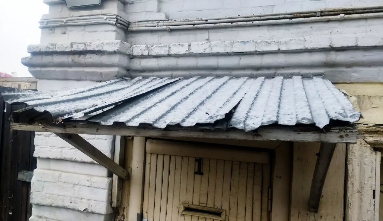 Фоторепортаж: скромный снег в конце ноября в старинной части Самары